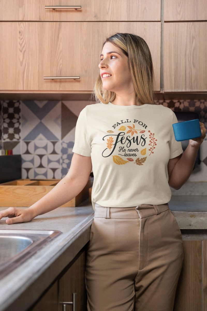 bella canvas t shirt mockup of a woman holding a coffee mug m34807