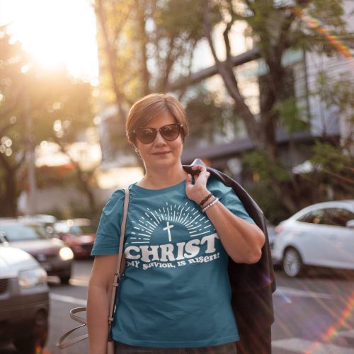 middle aged woman wearing a t shirt mockup carrying a jacket on her back a20719