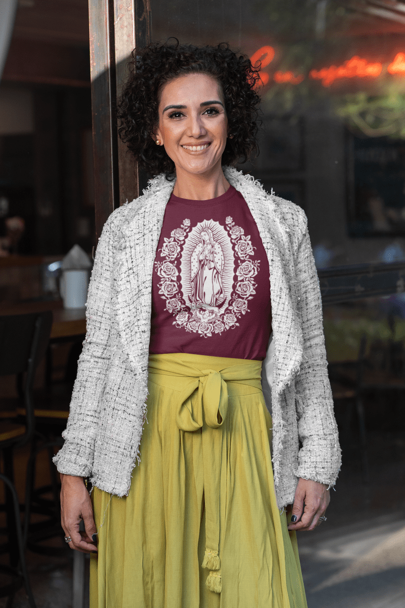 t shirt mockup featuring a middle aged woman with curly hair by a restaurant window 31613